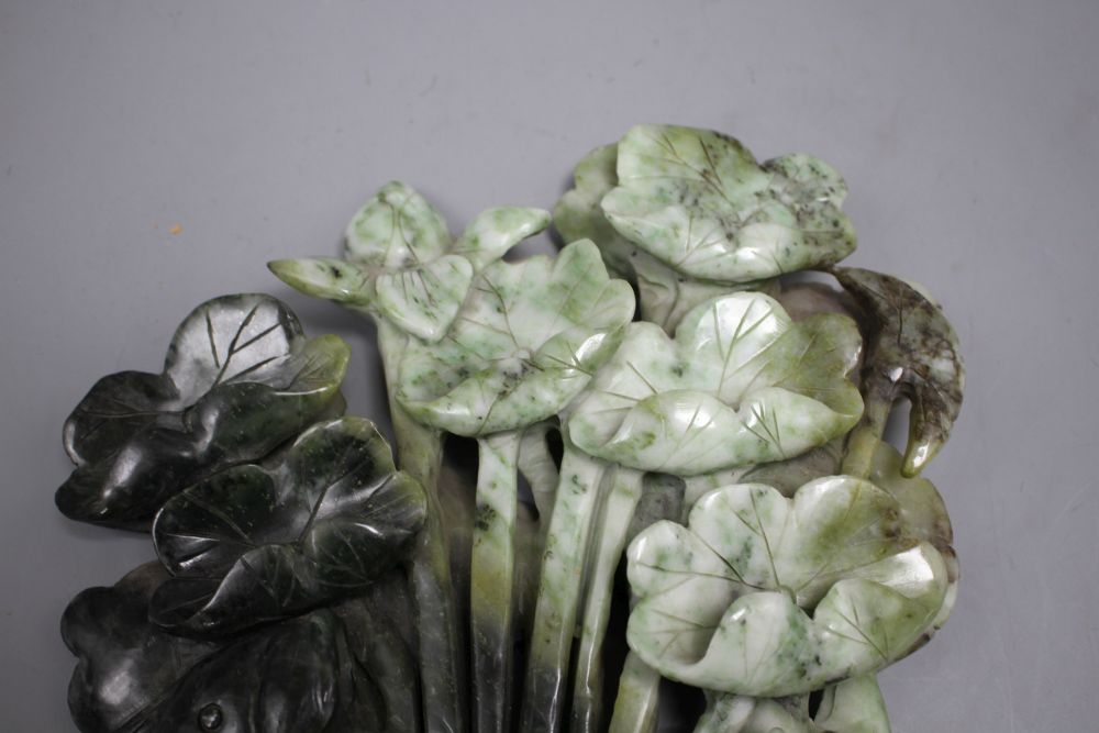 A Chinese carved jadeite group of a leaping carp and lotus flowers, height 30cm